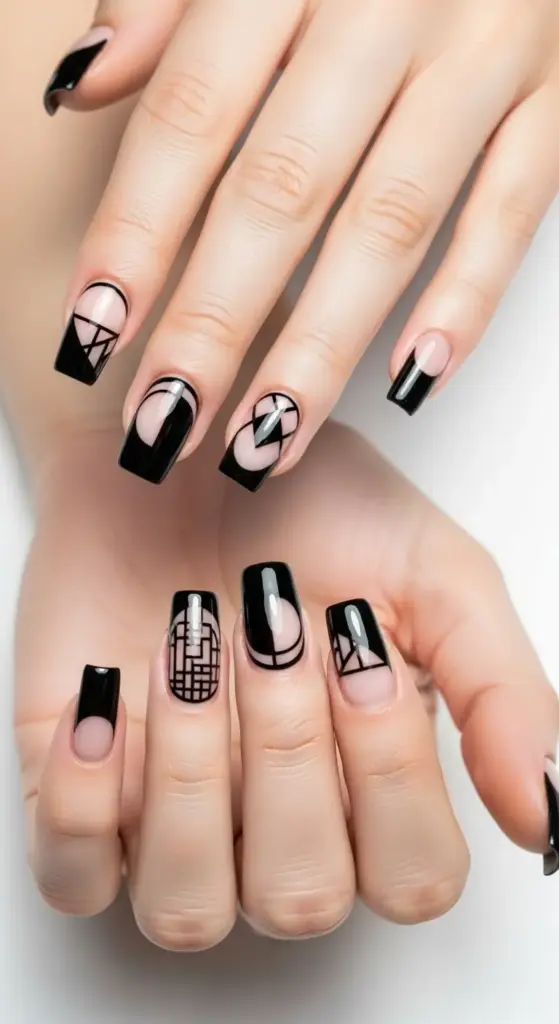 Stylish hands with an artistic manicure featuring abstract geometric nail art, including black lines, circles, and shapes over a clear base, creating a unique and modern take on black french tip nails.